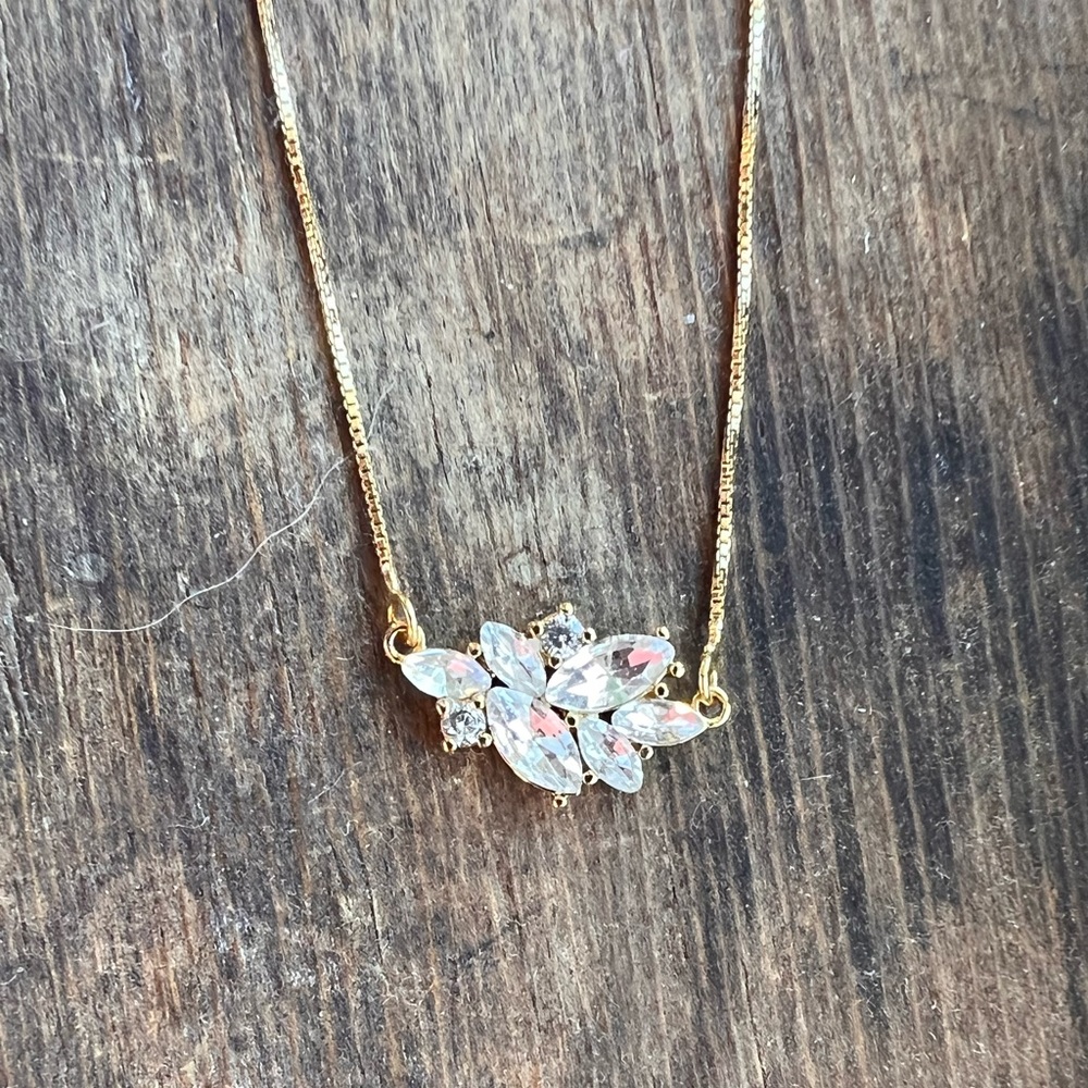 - Gold diamond necklace